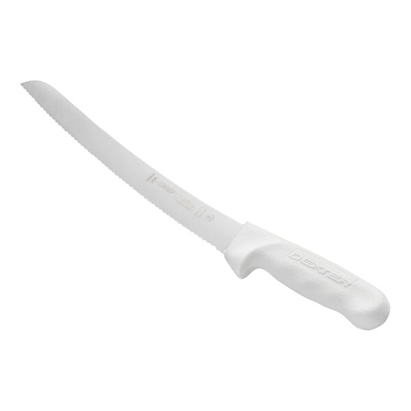 A serrated bread knife with a white handle and a long, scalloped blade.