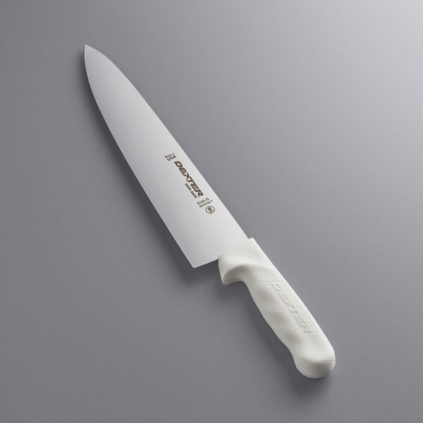 A Dexter-Russell Sani-Safe chef knife with a white handle.