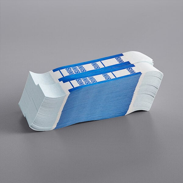 A stack of blue and white self-adhesive currency straps.