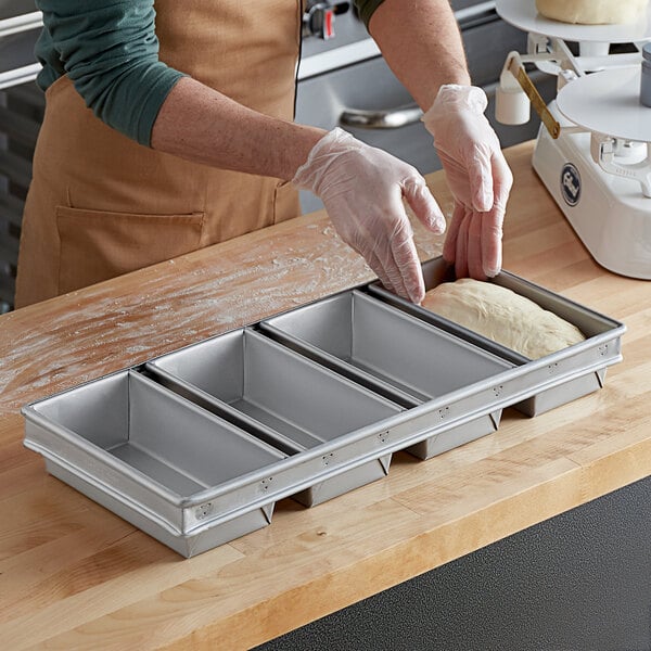 Baker's Mark 12 Compartment Glazed Aluminized Steel Mini Bread Pan - 6 oz.  Capacity, 4 x 2