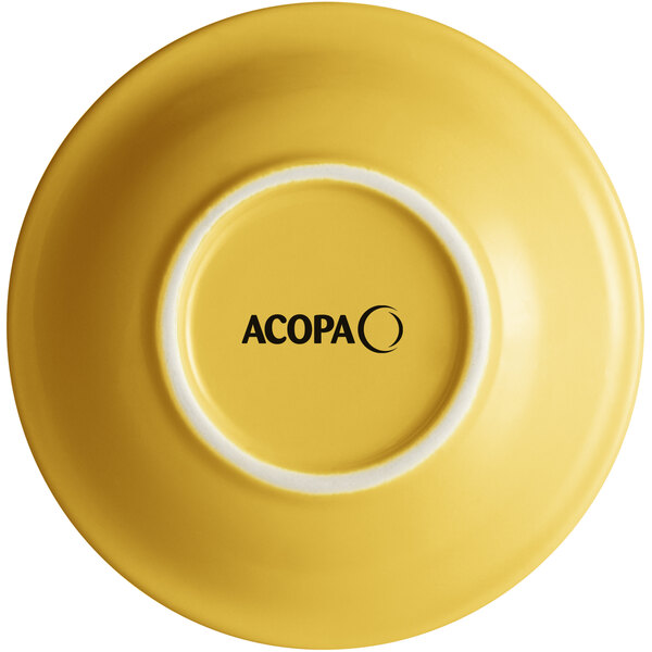 A yellow stoneware bowl with the word "Acopa" in black text.