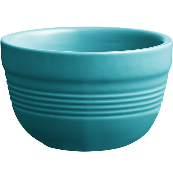 a blue bowl with a white background
