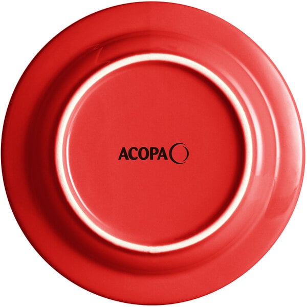 A red stoneware plate with a white rim and the word "Acopa" in black text.