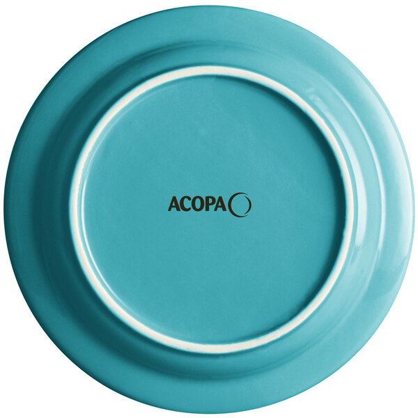 A Caribbean turquoise stoneware plate with a white rim and the word "Acopa" in black.