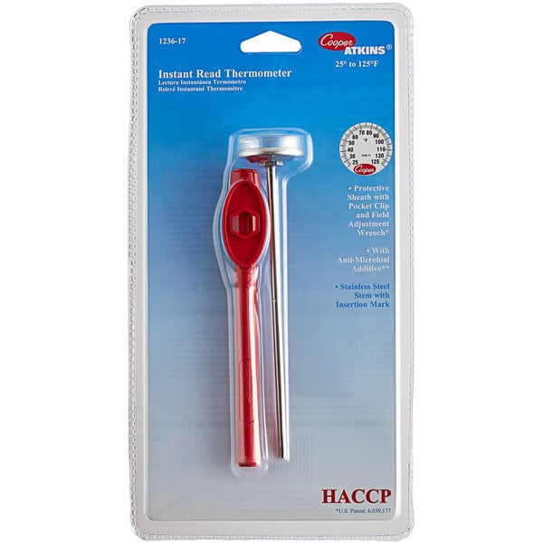 A clear plastic package containing a red and silver Cooper-Atkins pocket probe thermometer with white stripes on the red handle.