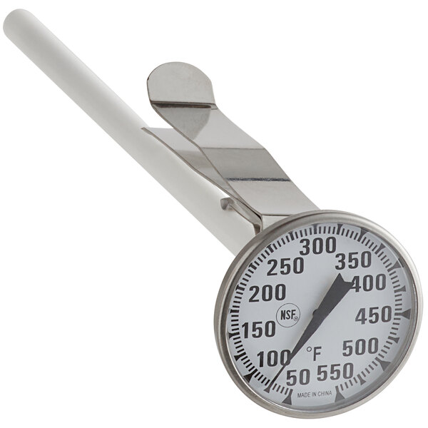 A close-up of a Comark pocket probe dial thermometer with a white handle and silver metal.