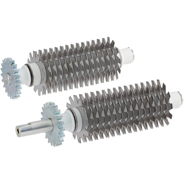 A close-up of two metal gears.