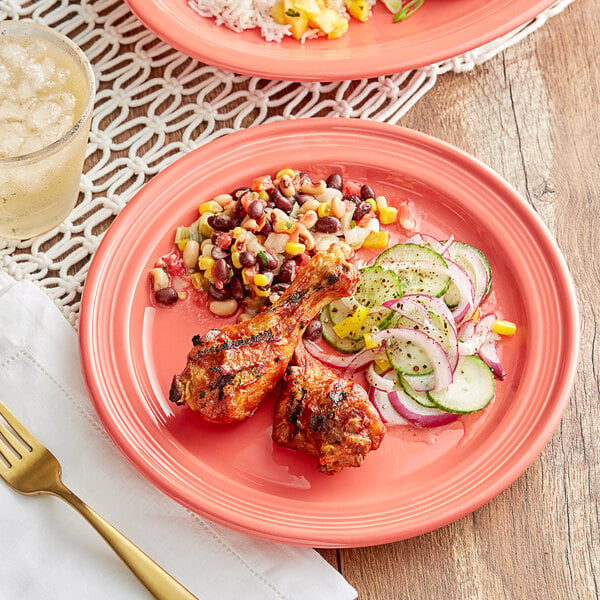 An Acopa Capri stoneware plate with chicken, corn, and rice on a table