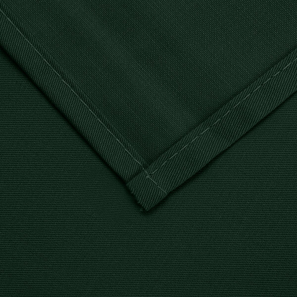 A close up of a hunter green hemmed cloth table cover.