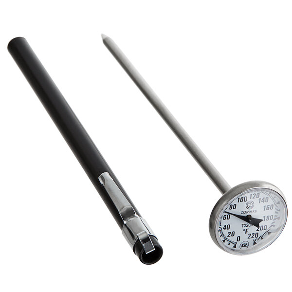 A Comark pocket probe thermometer next to a black pencil.