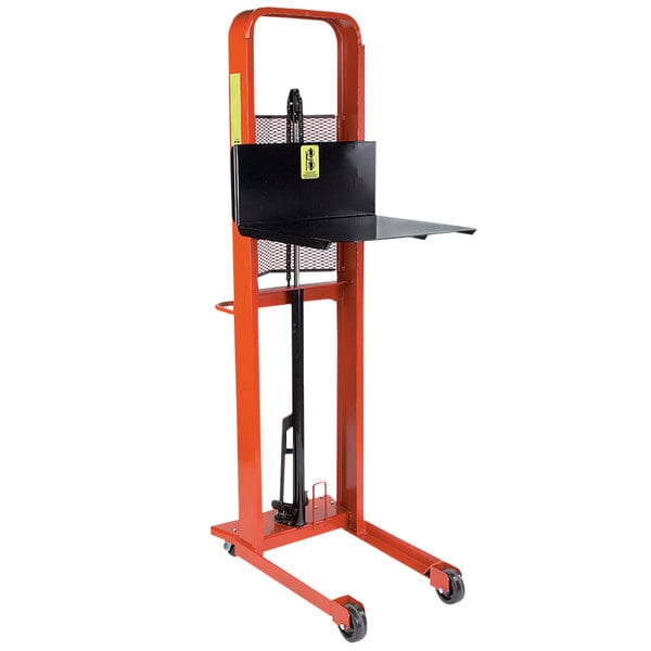 A Wesco black and orange hydraulic platform stacker with a black tray on top.