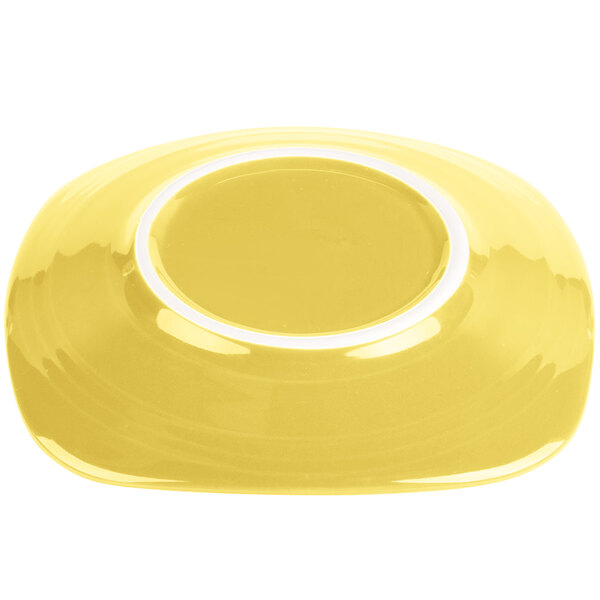a yellow liquid in a bowl