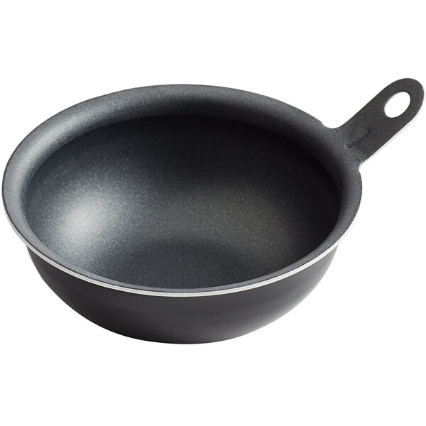 A black Vollrath Wear-Ever aluminum egg poacher cup with a handle.