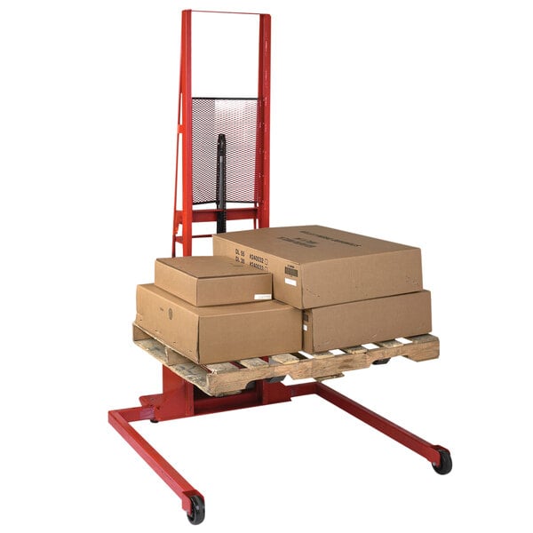 A red metal Wesco Industrial Products fork stacker with boxes on it.