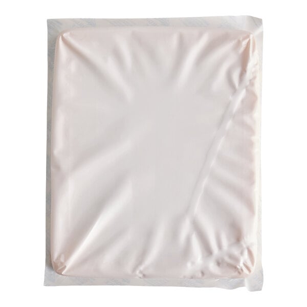 A rectangular foam brick cold pack sealed in plastic packaging.