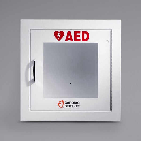 A white surface mount AED cabinet with a glass window and red text.