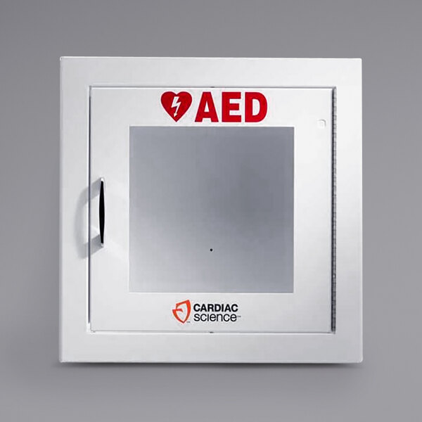 A white Cardiac Science AED cabinet with a glass window and red lettering.