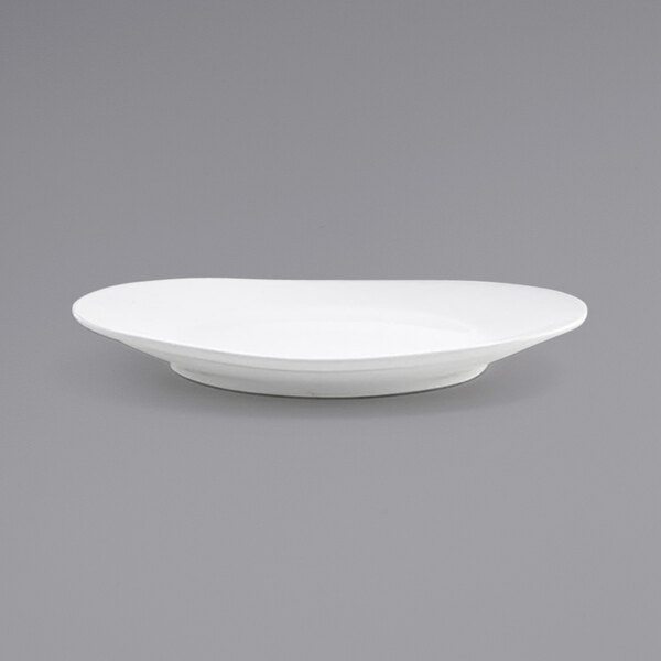 a white plate on a gray background