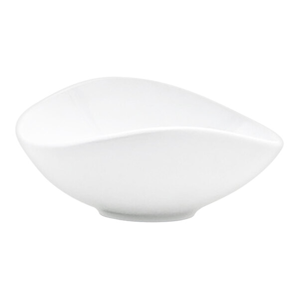A small white oval porcelain ramekin with a modern, curved design.