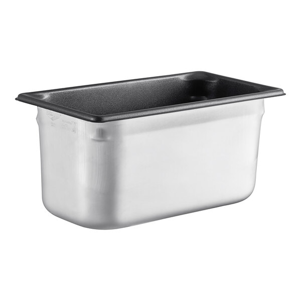 A Vollrath stainless steel steam table pan with a black lid.