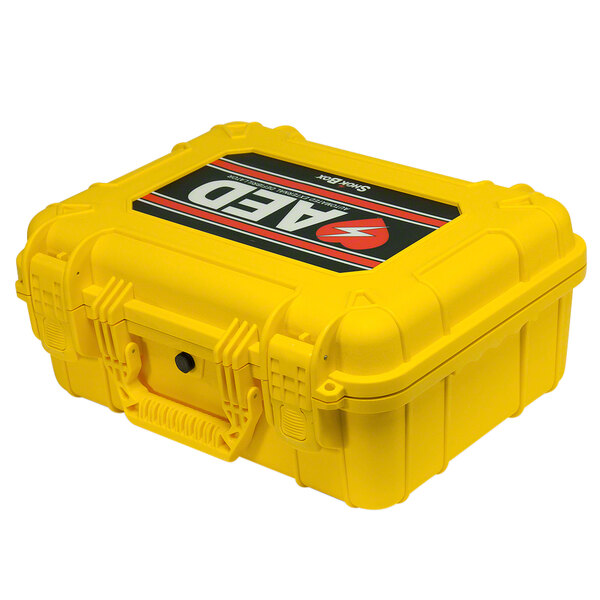A yellow plastic watertight hard case with a black and red label reading "Defibtech Lifeline AEDs"