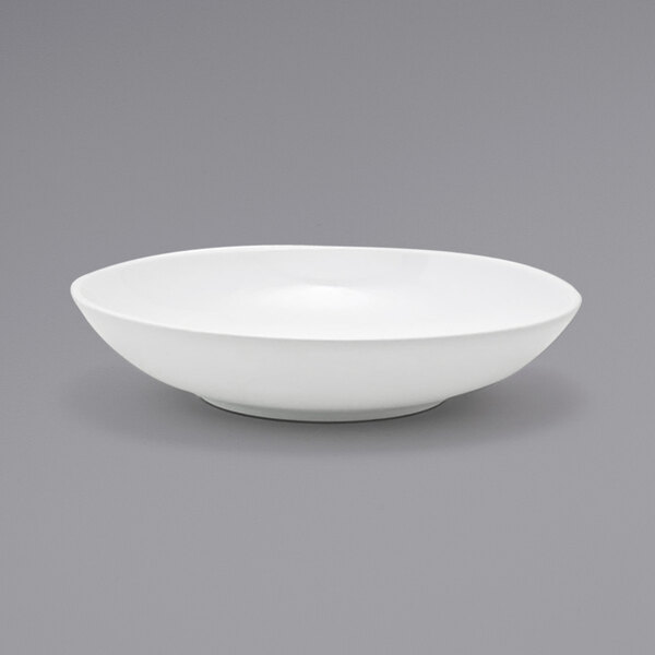 a white bowl on a gray background