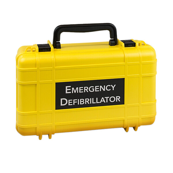 A yellow plastic Defibtech deluxe hard case for Lifeline and Lifeline AUTO AEDs with black handle and white text.