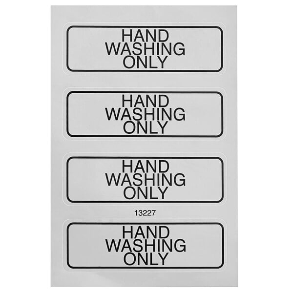A group of white rectangular signs with black text that say "Hand Washing Only"