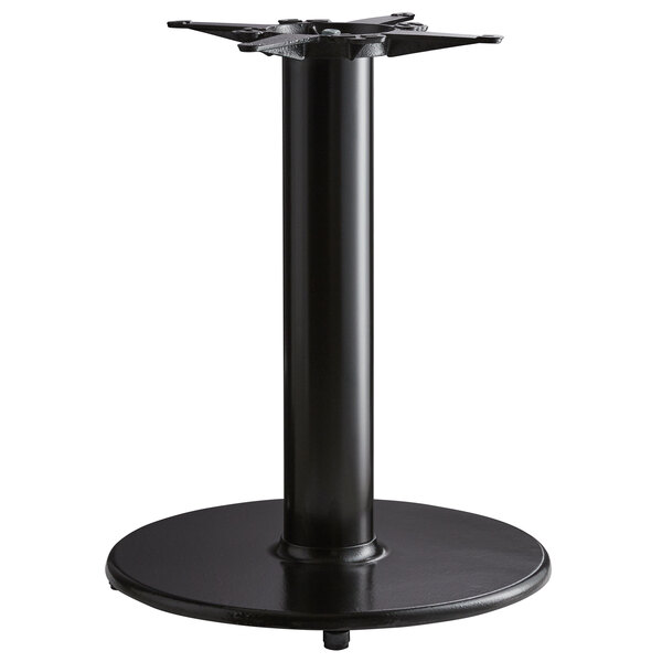 A black Lancaster Table & Seating round cast iron table base.