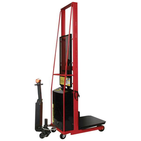 A red and black Wesco Industrial Products hydraulic power lift platform stacker.