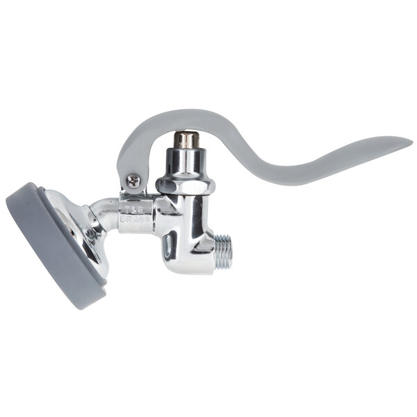 A T&S chrome pre-rinse spray valve with a white handle.