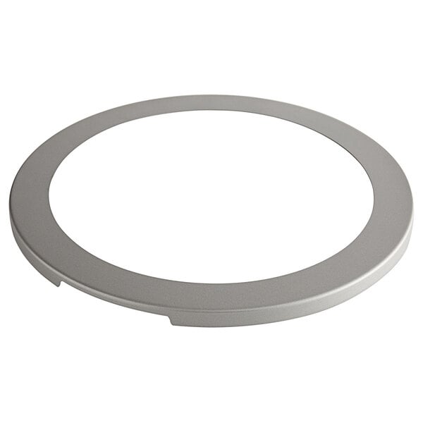 A round silver Fox Run pie crust shield with a white circle in the center.