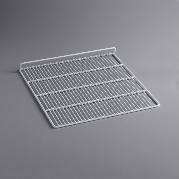 A white metal grid shelf for an Avantco Deli Case.