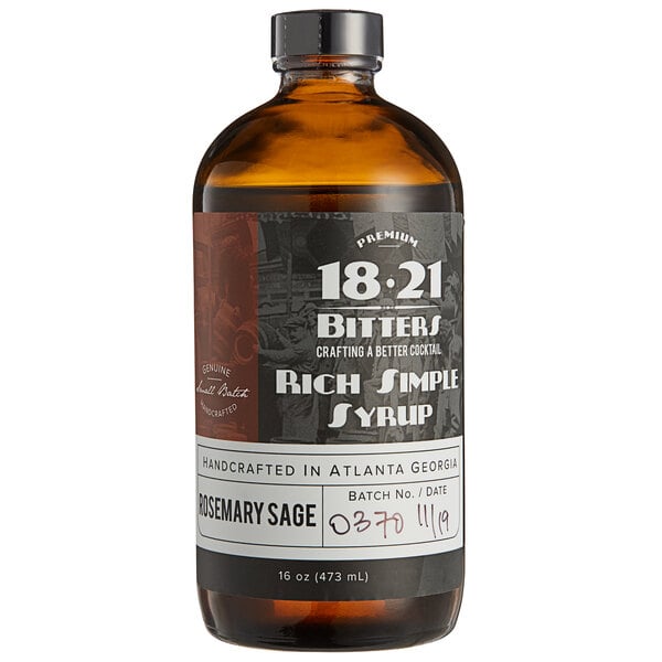 An 18.21 Bitters bottle of Rosemary Sage Concentrated Syrup with a black label on a brown bottle.