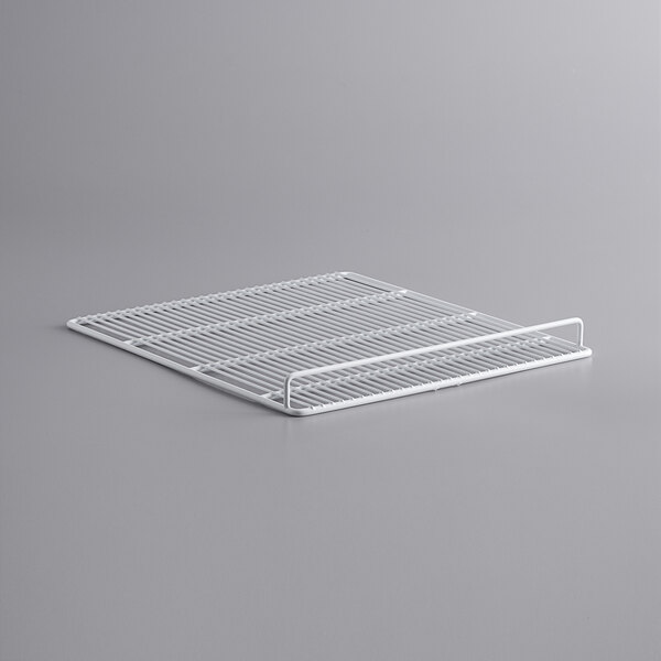 A white metal wire shelf for an Avantco deli case.