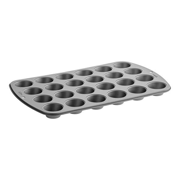 A Wilton mini muffin pan with 24 holes.