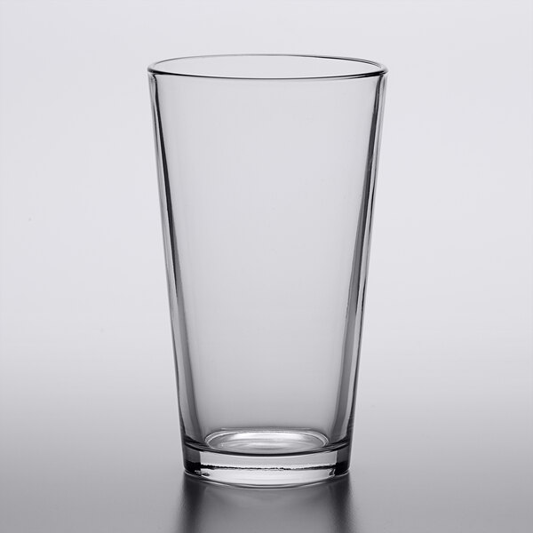 a clear glass on a white surface