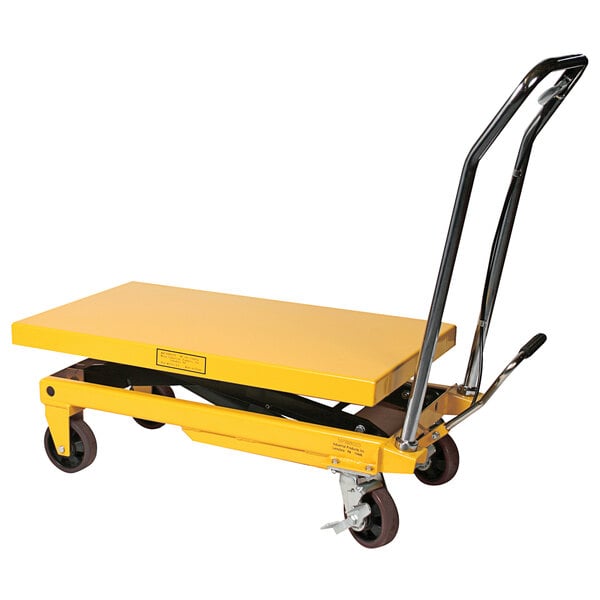 A yellow Wesco Industrial Products scissors lift table with black wheels.