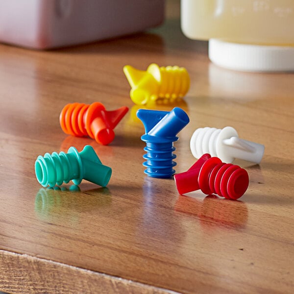 a group of colorful plastic objects on a table