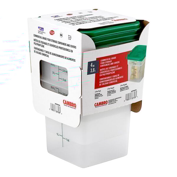 A box of Cambro translucent square polypropylene food storage containers with green lids.