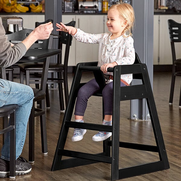 child in restaurant high chair
