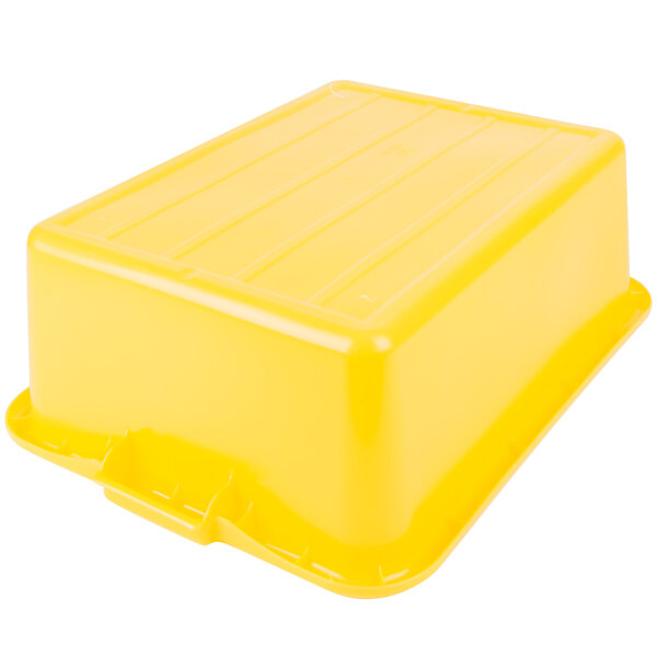 a yellow plastic container with a lid