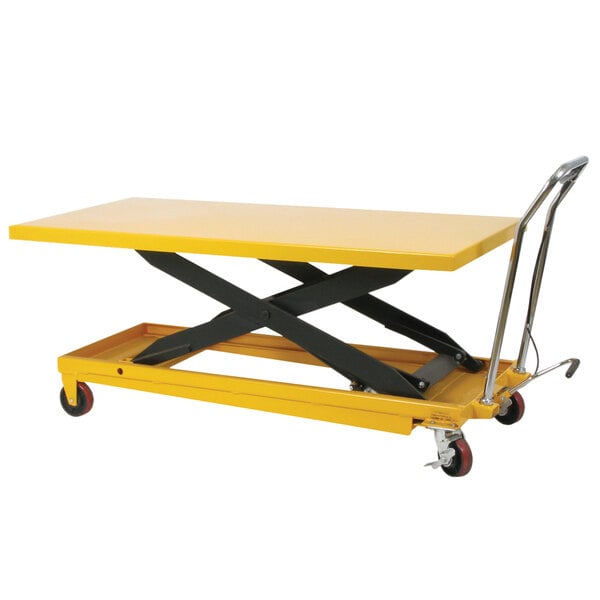 a yellow scissor lift table