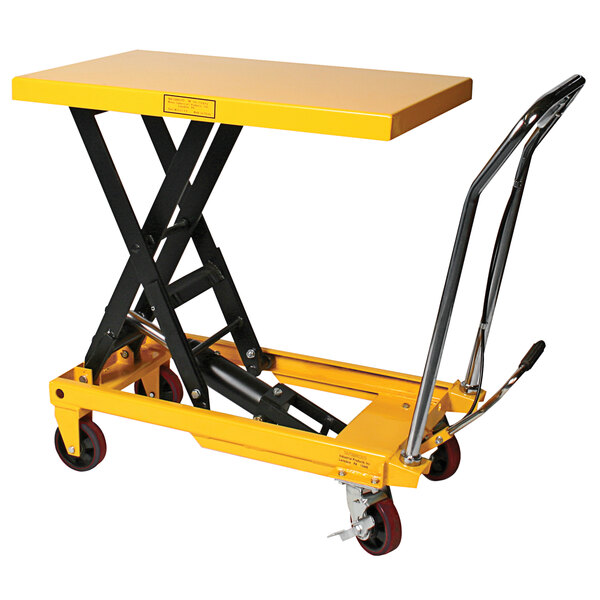 A yellow Wesco scissors lift table with black wheels.