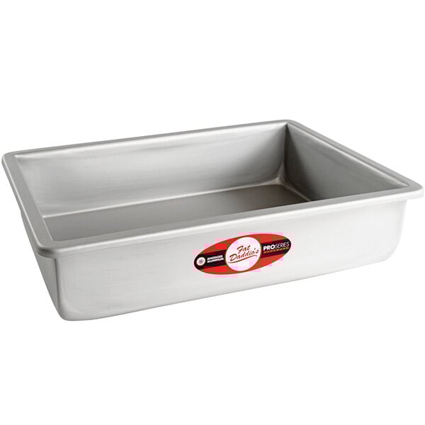 A silver rectangular Fat Daddio's cake pan with a red and white label.