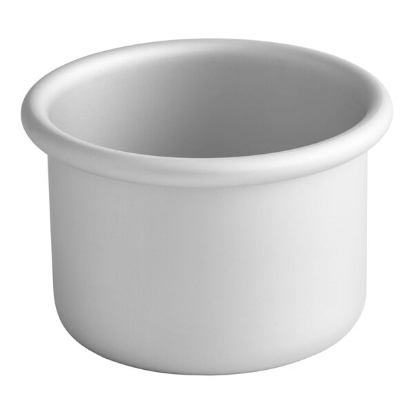 A white round container with a white background.