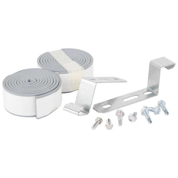 A close-up of two metal corner brackets with screws.