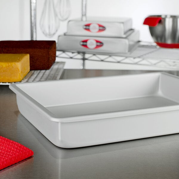 A white rectangular baking pan on a counter.