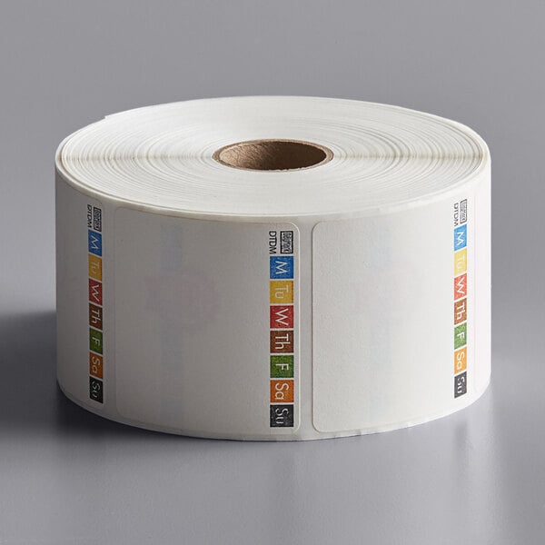 A roll of white DayMark Dissolvable food labels.