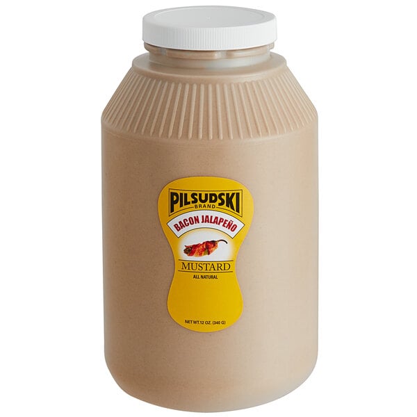 A jar of Pilsudski Bacon Jalapeno Mustard with a yellow label on a white background.